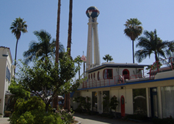 Palm trees surround the iconic Crossroads tower.