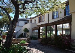 Crossroads' east courtyard features trees, abundant landscaping and period architectural details.