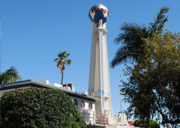 The Crossroads tower and ship portholes are the backdrop for this courtyard area.