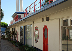 A view of the Crossroads tower and ocean liner, looking towards Sunset Blvd.