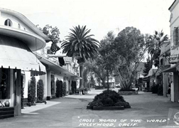 The Crossroads east courtyard looking north from Sunset Blvd.  Note the Barber of Seville shop on the right.
